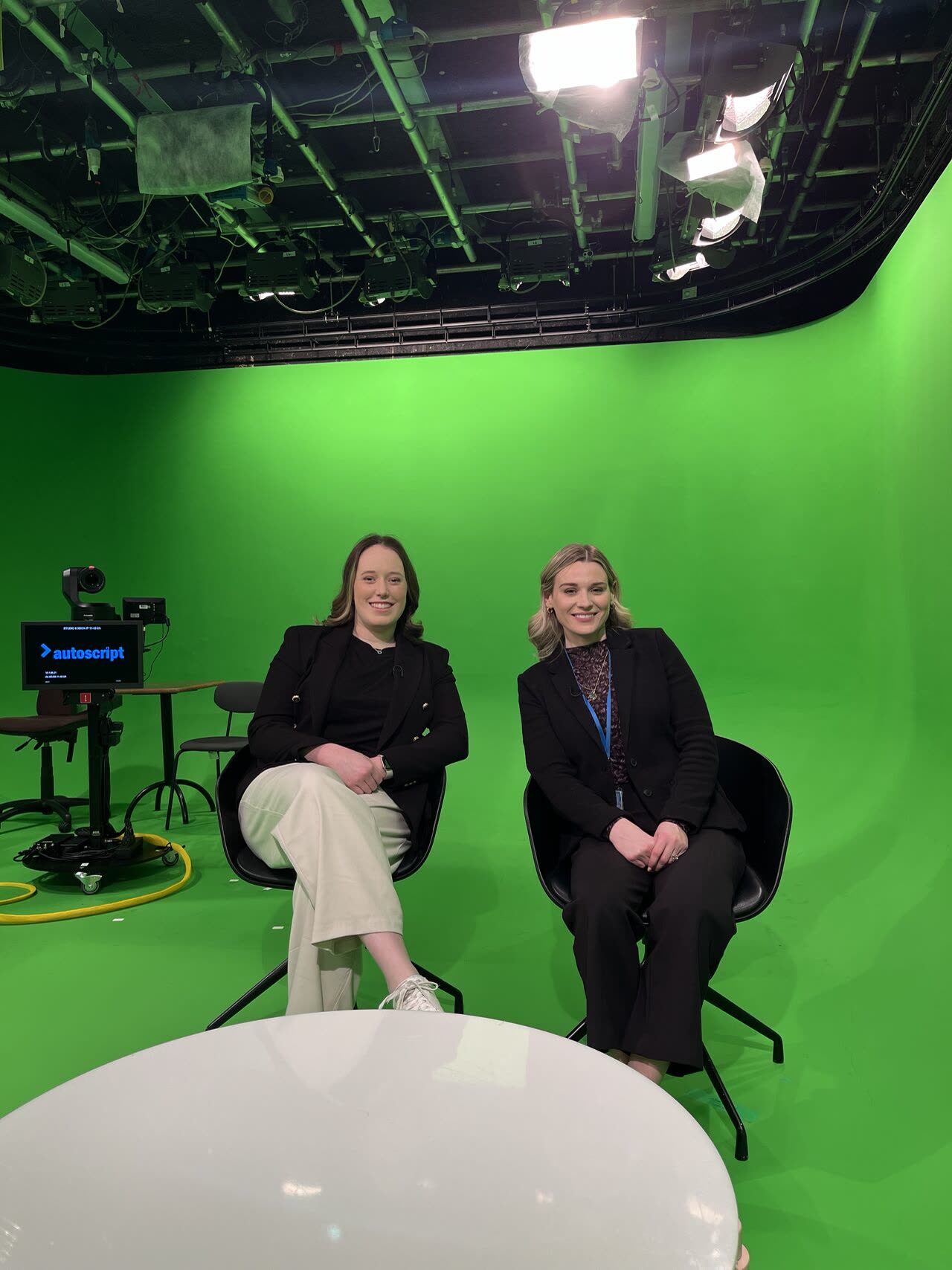 Orla Keeling in a television studio on the green screen set