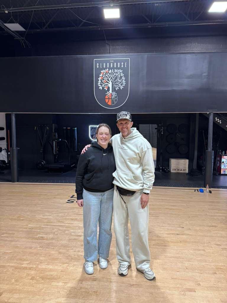 Orla Keeling on court at The Clubhouse with NBA skills coach Adam Harrington
